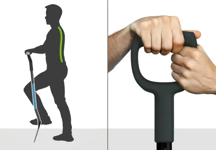 Ergonomiczna szufla z uchwytem, który zapewnia prawidłową postawę podczas pracy. Dwie dłonie pewnie chwytają rękojeść.