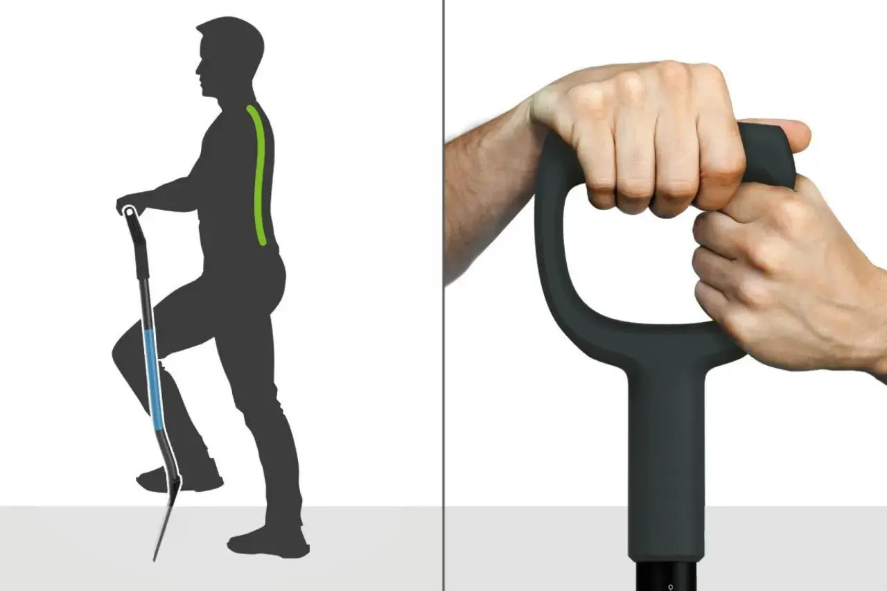 Ergonomiczna szufla z uchwytem, który zapewnia prawidłową postawę podczas pracy. Dwie dłonie pewnie chwytają rękojeść.